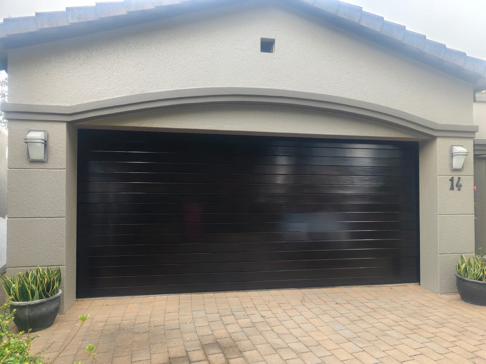 Glossy Dark Garage Door
