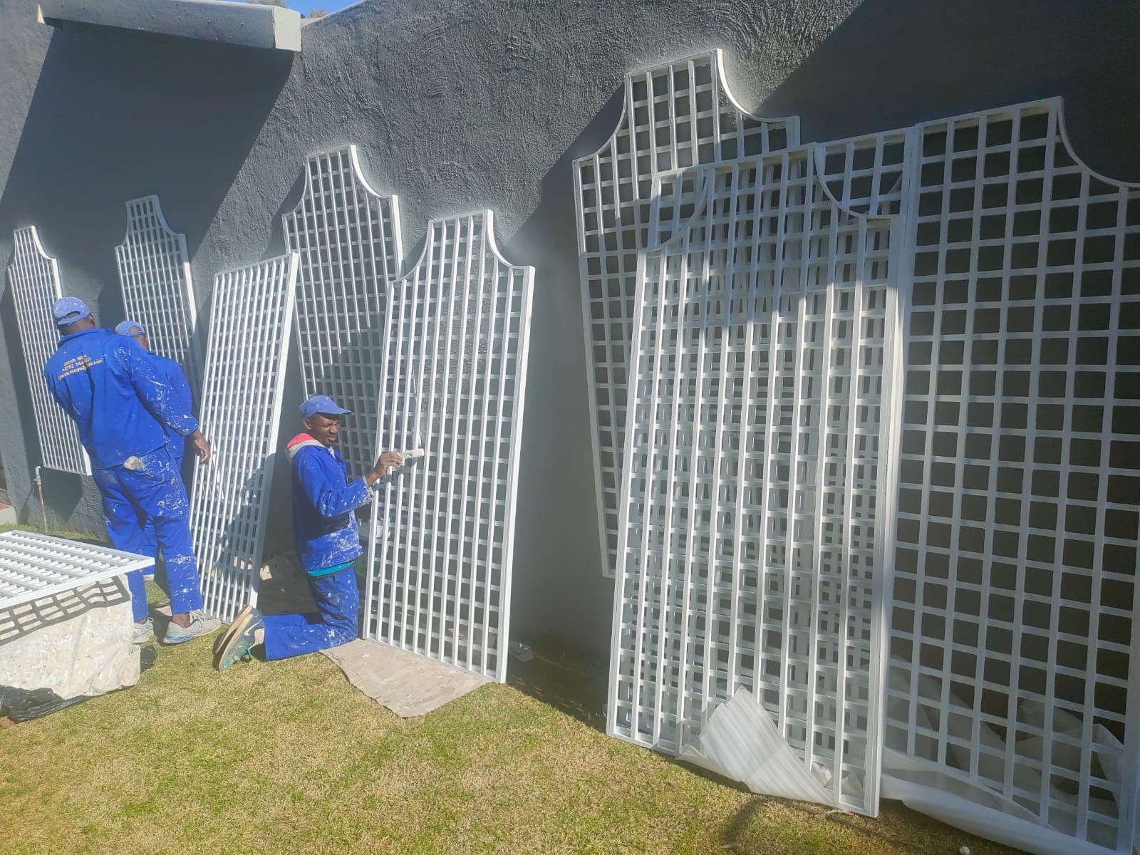 Team Painting Trellis Panels
